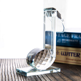 QFkris crystal musical sculpture on a bookshelf as decorative piece