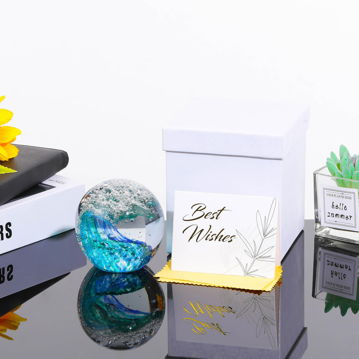 Qianwei hand-blown crystal ball highlights ocean waves for desk decor and serene display.