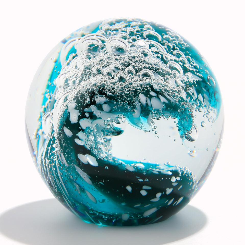 Qianwei hand blown ocean waves crystal ball shines in sunlight as a desk accent