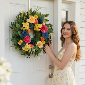 Qiexuxing durable-base wreath preserves shape for extended outdoor seasonal displays.