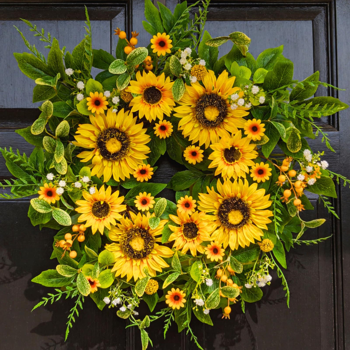 Qiexuxing Sunflower Wreath on front door boosts spring curb appeal.