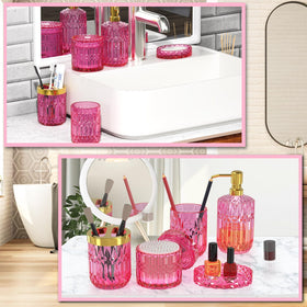 QIQU hot-pink glass bathroom set on counter adds cohesive style.