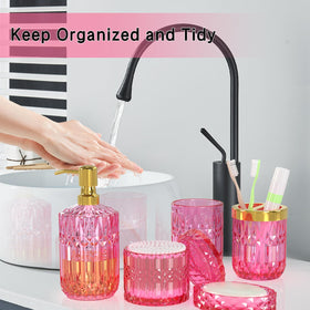 QIQU hot-pink glass cotton swab jar stores essentials neatly.