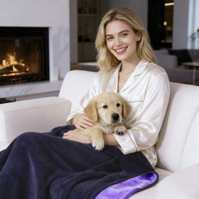 QiyI reversible blanket on a sofa, dual-tone design adds style and furniture protection.