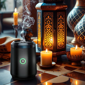 Qomkky bakhoor diffuser glowing with warm light while heating aromatherapy safely.