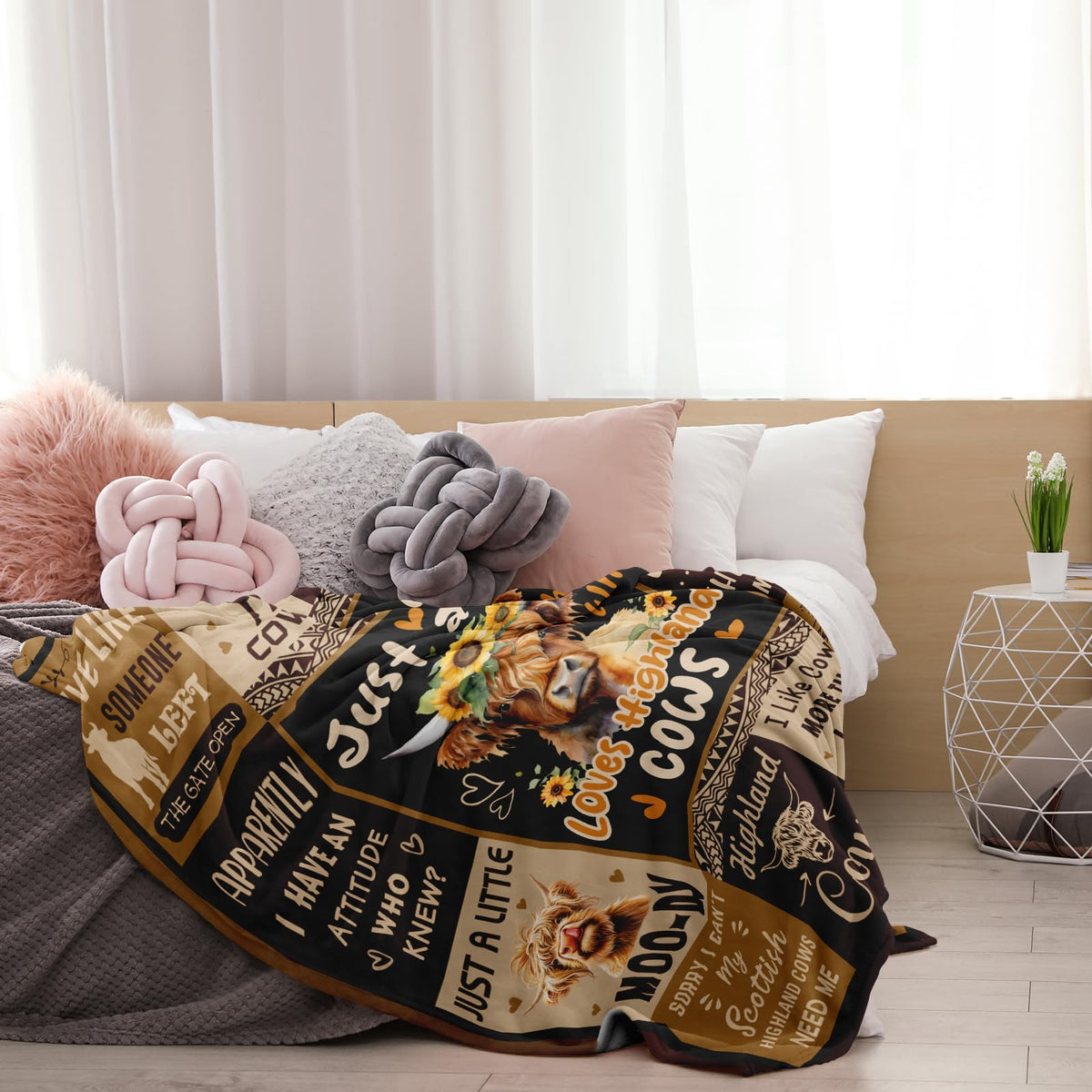 Qotuty Highland Cow Blanket features playful pattern.