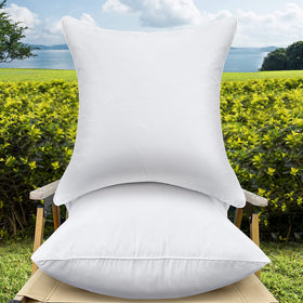 QSWRD 16x16 outdoor pillow inserts in porch setup offer durable outdoor comfort.