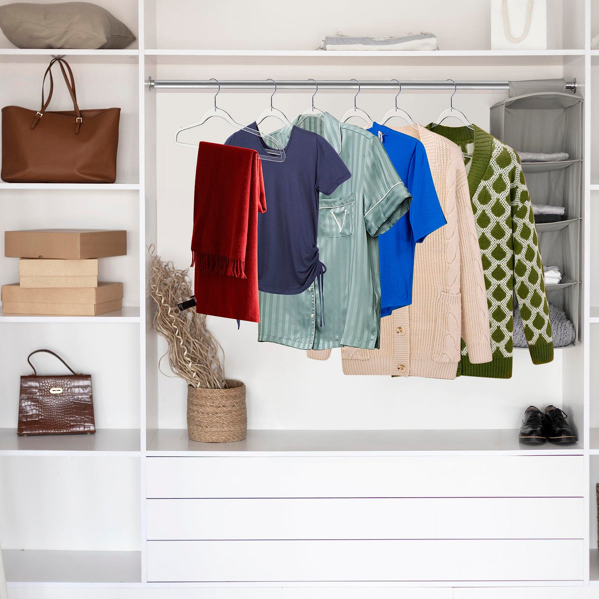 Quality Hangers versatile clear plastic hanger for blouses, shirts, and jackets.