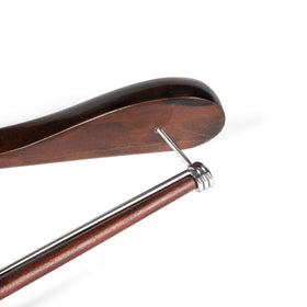 Quality Hangers durable solid wood hanger supports heavy coats with ease.