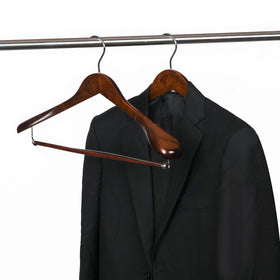 Quality Hangers locking bar wooden hanger keeps trousers aligned with jackets.