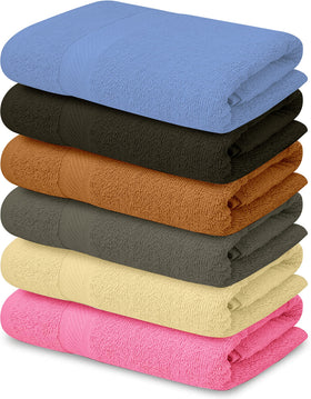 QUBA LINEN 100% cotton bath towels folded, showing soft texture and color variety.
