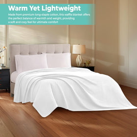 QUBA LINEN cotton blanket white bed highlights clean, airy bedding look.