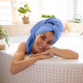 QUBA LINEN spa-like bathroom scene suggesting luxurious everyday ritual.