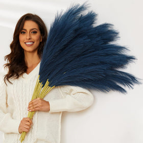 QUBITFUL blue pampas grass in a tall vase creates dramatic texture for living rooms.
