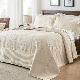 Qucover oversized king bedspread on bed with floor-to-floor coverage