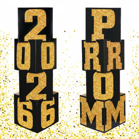 Queekay prom column boxes in gold and black create a chic prom backdrop.