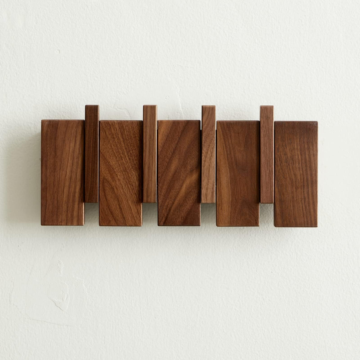 QUELLANCE piano-keys wall hook close-up for stylish entryway organization.