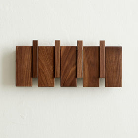 QUELLANCE piano-keys wall hook close-up for stylish entryway organization.