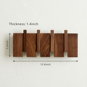 QUELLANCE solid wood coat hanger shows durable beech and pine grains.