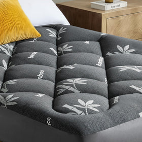 QuietSea bamboo-pillow-top mattress topper adds cloud-like softness to a queen bed