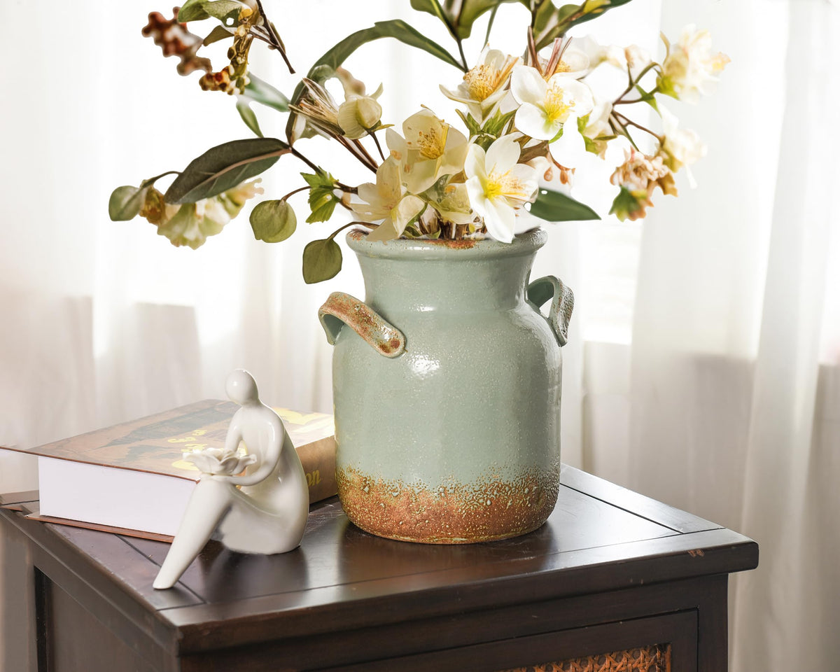 Quoowiit vase with distressed finish adds vintage charm to shelves