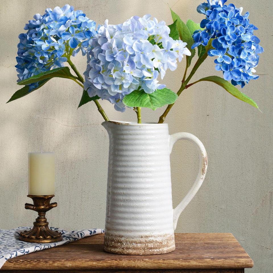 Quoowiit ceramic rustic vase with handle for easy repositioning and timeless centerpieces.