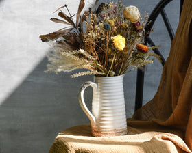 Quoowiit decorative vase for living rooms elevates shelf styling.