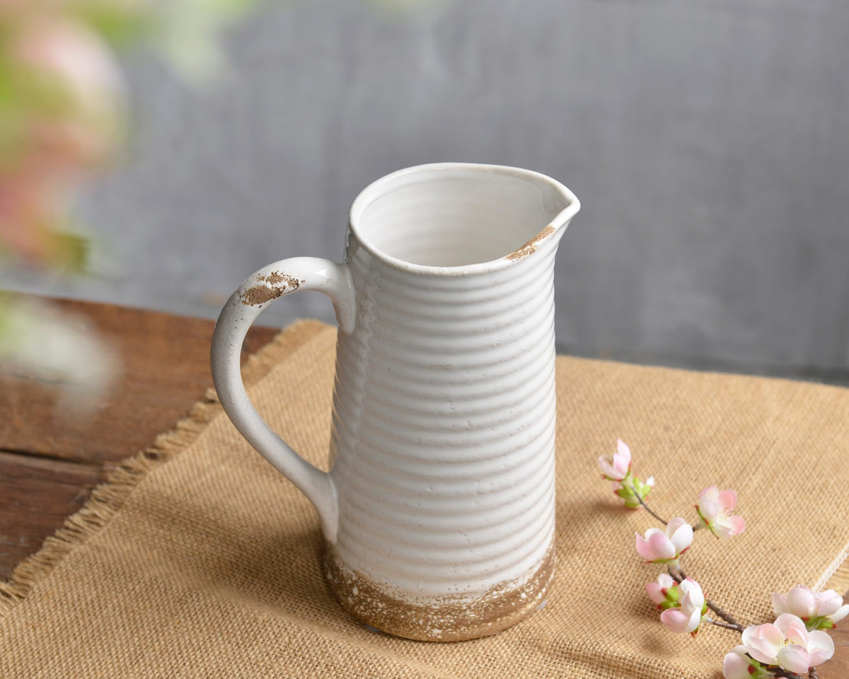 Quoowiit farmhouse centerpiece vase enhances dining table with rustic style.