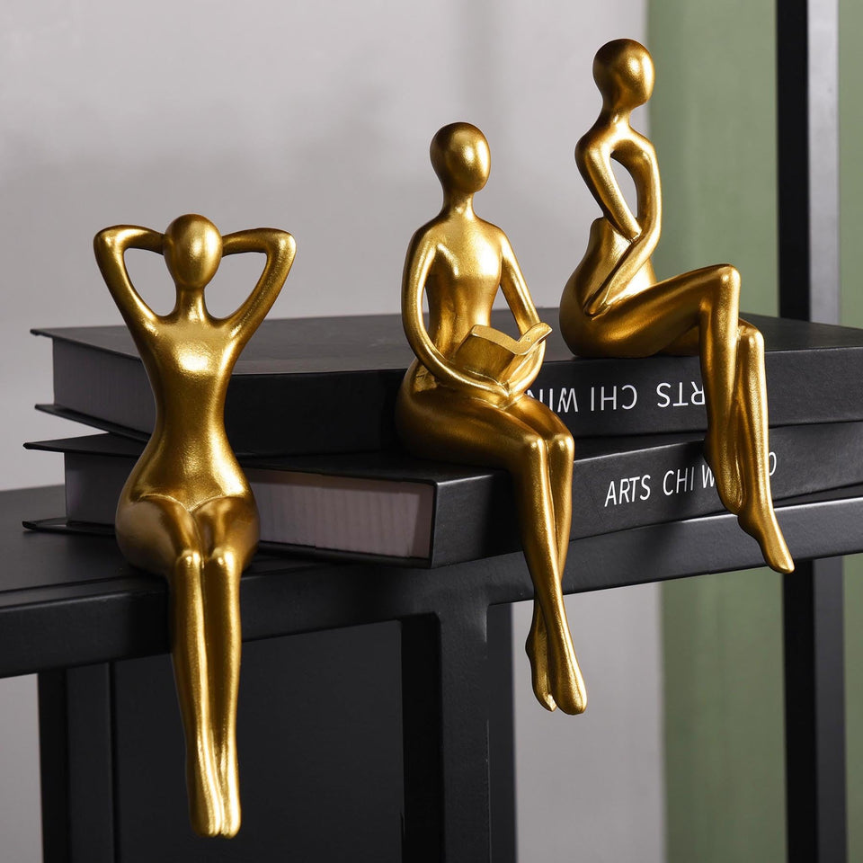 Quoowiit gold thinker statue abstract—elegant desk decor for quiet reflection.