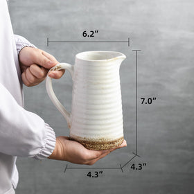 Quoowiit multi-purpose centerpiece vase doubles as practical shelf decor.
