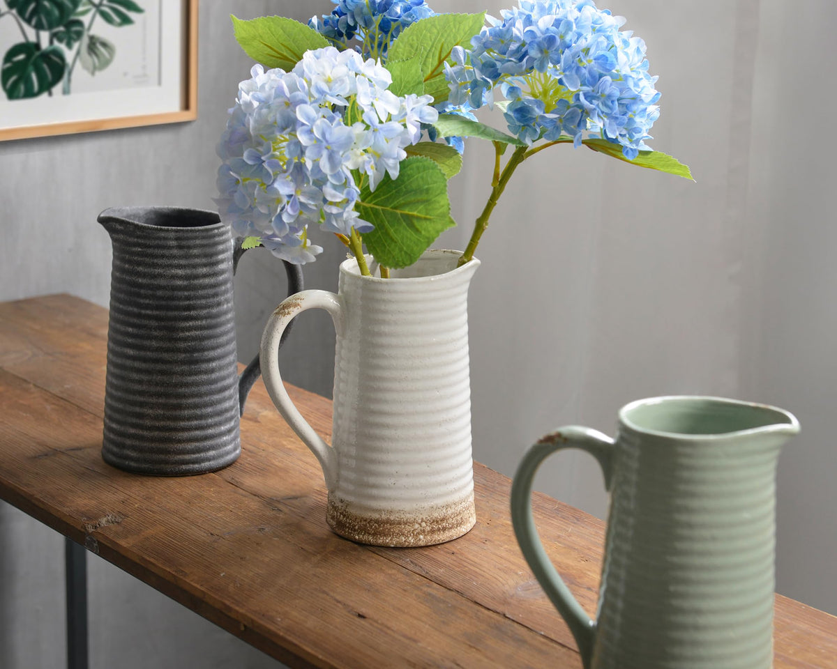 Quoowiit rustic vase elevates entryway or coffee table displays with warmth.