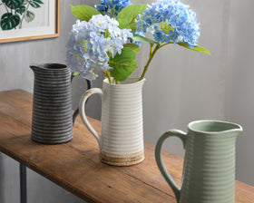 Quoowiit rustic vase elevates entryway or coffee table displays with warmth.
