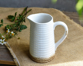 Quoowiit top-opening 4-inch vase ideal for easy bouquet changes.