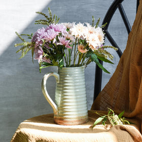 Quoowiit farmhouse vase makes a thoughtful gift for housewarmings and celebrations.