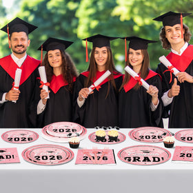 QZYL cohesive pink theme ties all items into a polished graduation setup.