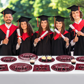 QZYL cohesive table setting, wine-red theme ties plates, napkins, and decor together.