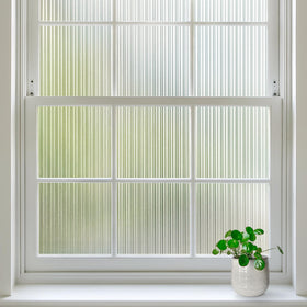 Rabbitgoo reeded glass window film with a three-dimensional privacy texture.