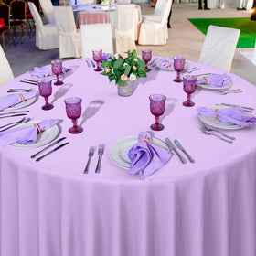 Soft lilac shade of Ragnhild tablecloth enhancing party ambiance and decor.