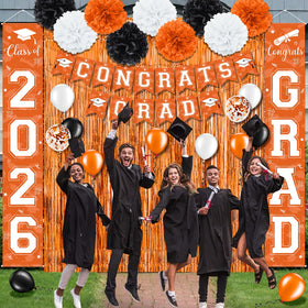 Ragnhild paper flower balls in orange, black, white brighten displays