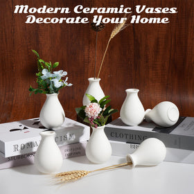 Rainmae white bud vases suit table centerpieces across living spaces and events.