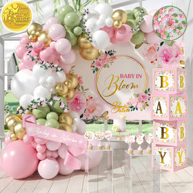 RainMeadow balloon arch in pink and sage greens creates an elegant baby shower backdrop