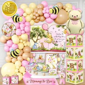 RainMeadow balloon arch in pink Pooh theme creates a picture-perfect baby shower entrance
