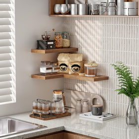 Ralgend living room shelves display books and framed photos neatly.