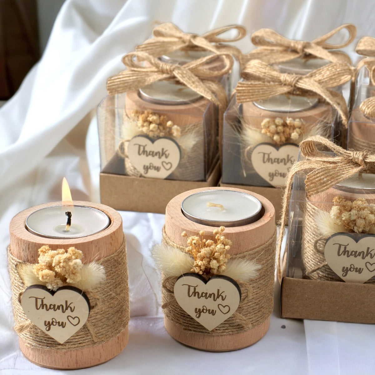 Rallad heart-tag rope-detail tealight holder expresses guest appreciation.