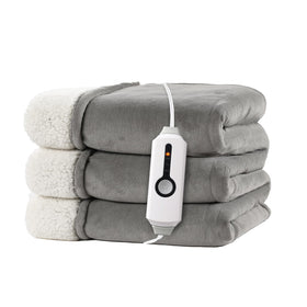 Ralysun electric heated blanket full-size 72x84 on bed with dual-sided sherpa warmth