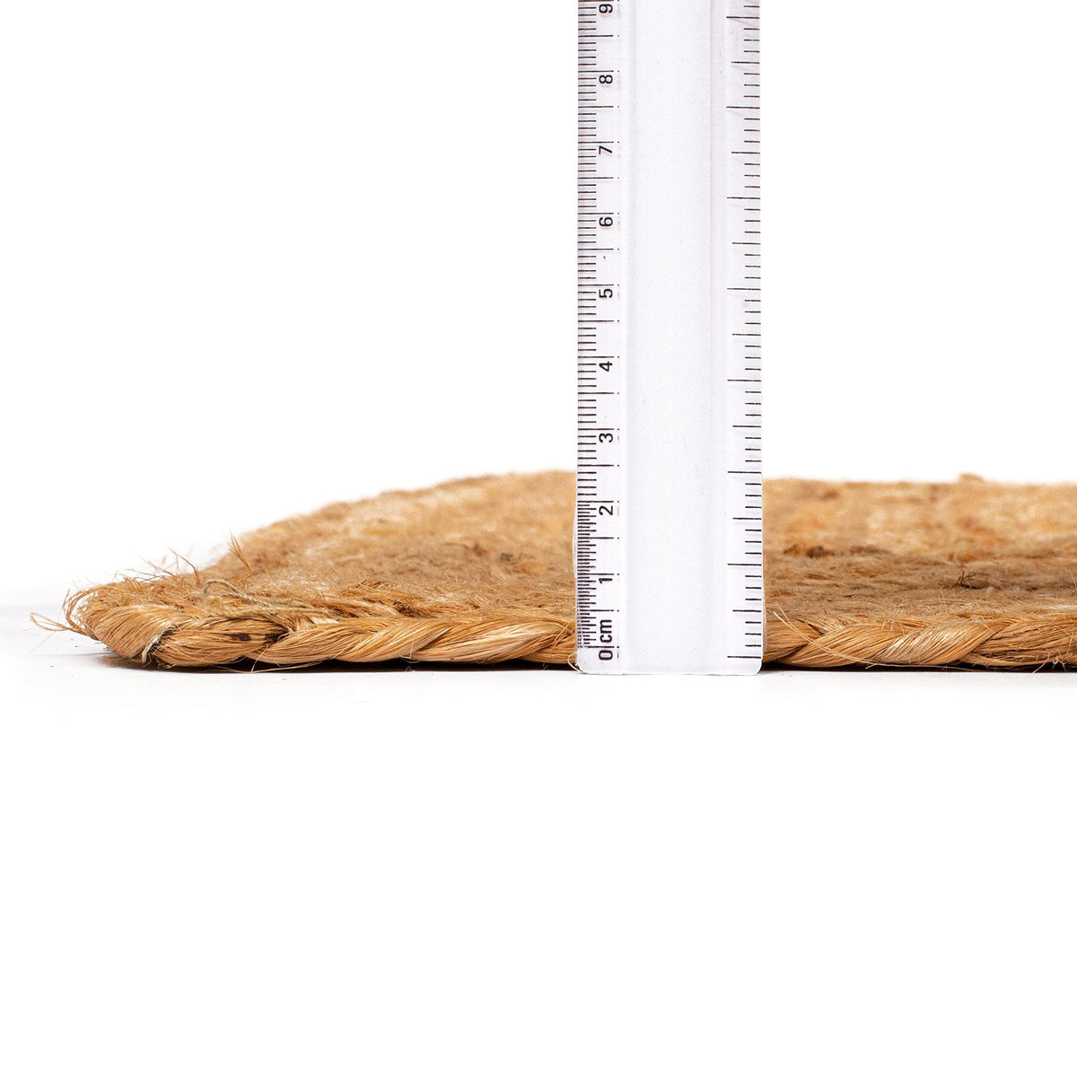 Ramanta Home natural fiber rug guards floors while adding soft, earthy elegance.