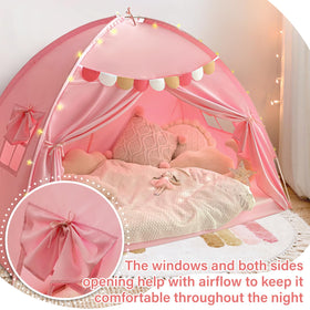 Razee bed tent includes pennant banners for a fun vibe.
