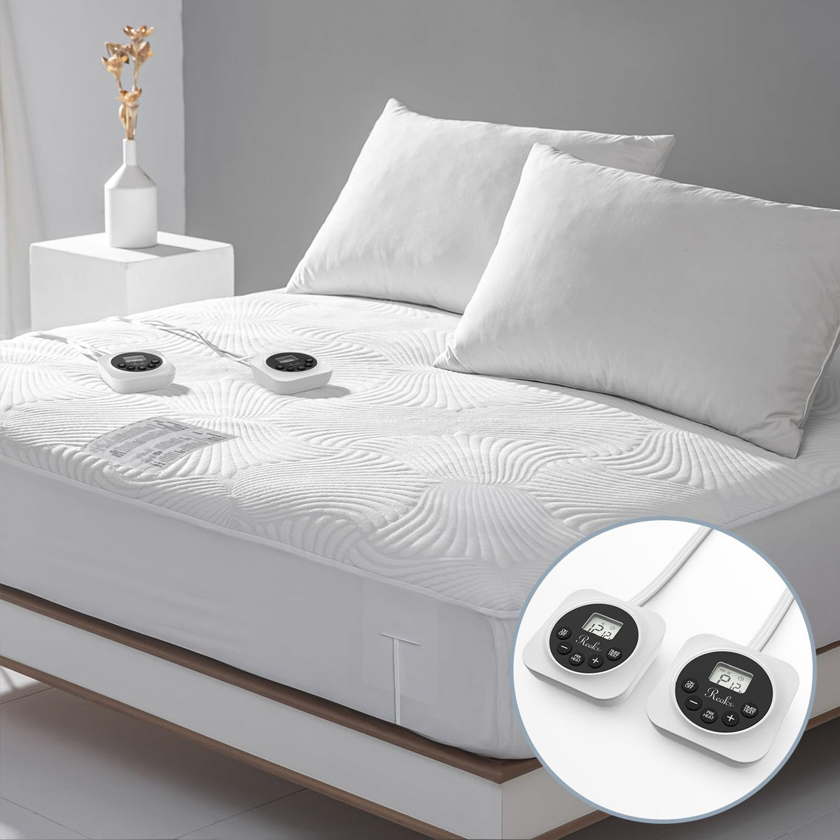 Reaks king-size heated mattress pad top view with dual controls for personalized warmth.