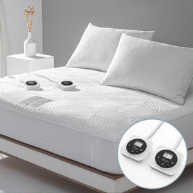 Reaks king-size heated mattress pad top view with dual controls for personalized warmth.