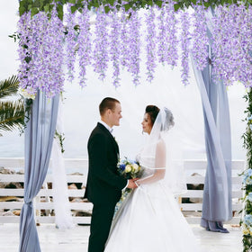 RECUTMS silk lilac vines create a lush wall effect.
